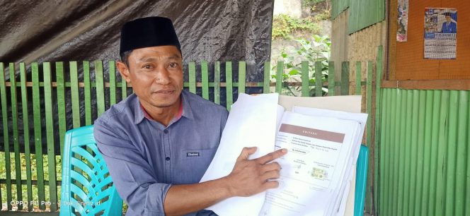 
					Irwan Bantah Tudingan Mark Up Pengadaan Mobil Bumdes Lumbutarombo