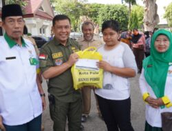 Pemkot dan Baznas Palu Bersinergi Bantu Para Penyapu Jalan dalam Program Sosial