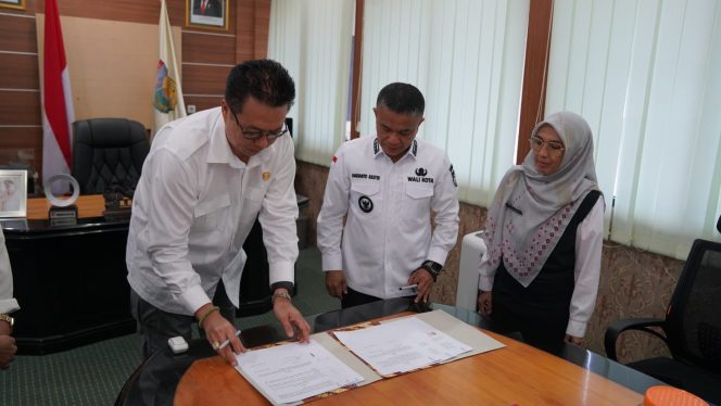 
					Photo : Humas Pemkot Palu