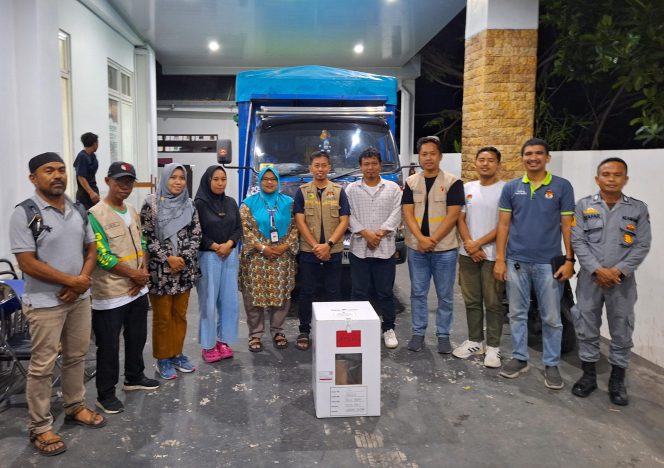 
					Suasana saat KPU Kota Palu menerima kotak suara dari PPK. Photo: TIM