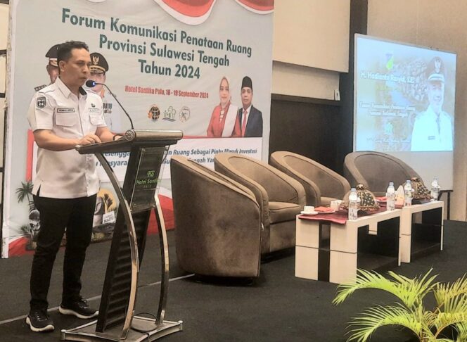 
					Kepala Dinas Penataan Ruang dan Pertanahan Kota Palu, Achmad Arwien saat memberi sambutan Wali Kota Palu di Hotel Santika Palu. //FOTO:YUSUF