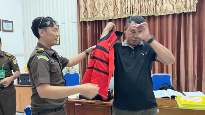 
					Tersangka Warham saat ditetapkan tersangka. FOTO: istimewa