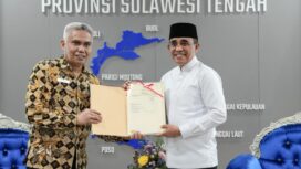 Penyerahan dokumen sertifikat tanah aset Pemerintah Provinsi Sulawesi Tengah sebagai bagian dari upaya pengamanan aset daerah dan penguatan kepastian hukum pertanahan. FOTO: istimewa